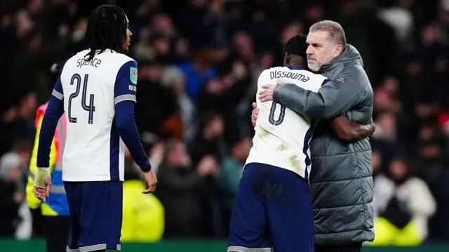 Ange Postecoglou hugs Spurs players