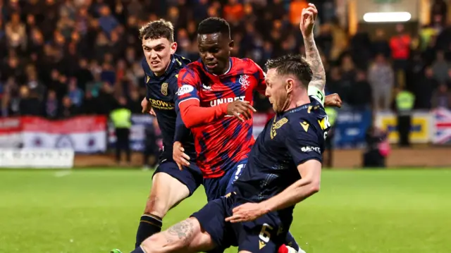 Rangers Rabbi Matondo and Dundee's Jodn McGhee in action