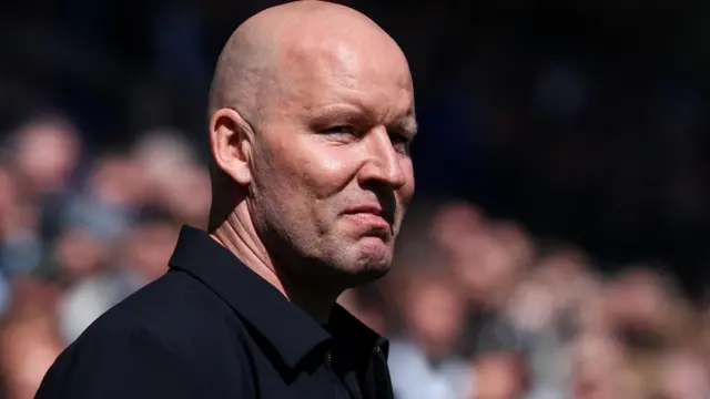 Henrik Pederson looks to his left with a straight face