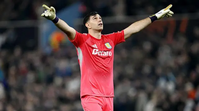 Emiliano Martinez of Aston Villa celebrates his side's second goal 