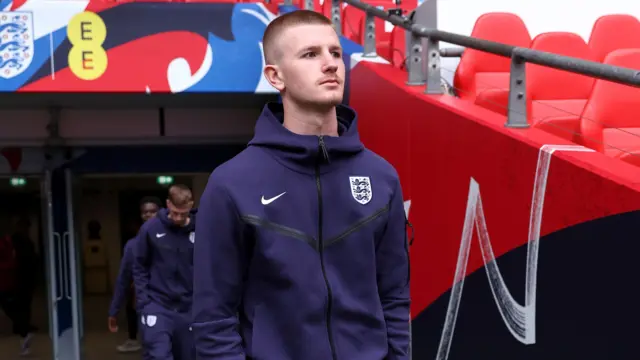 Adam Wharton looks on for England before friendly