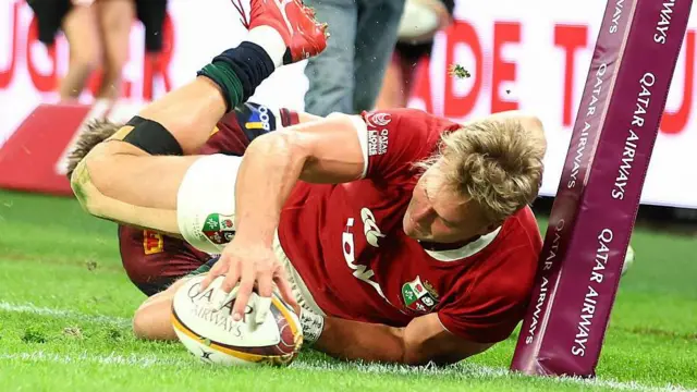 Duhan Van Der Merwe of the British & Irish Lions scores a try during the tour match against Queensland Reds