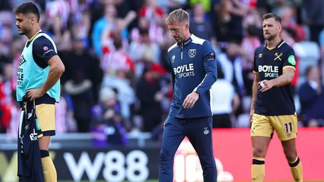Graham Potter leaves the pitch after West Ham's opening-day Premier League defeat at Sunderland