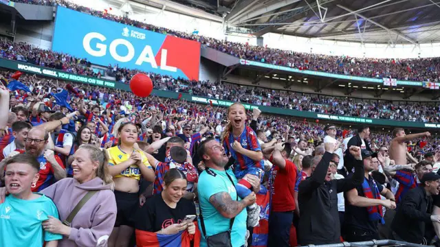 Crystal Palace fans celebrate the opening goal