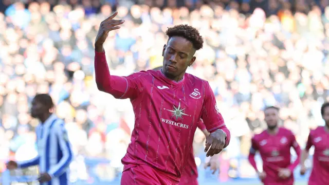 Jamal Lowe celebrates scoring at Sheffield Wednesday