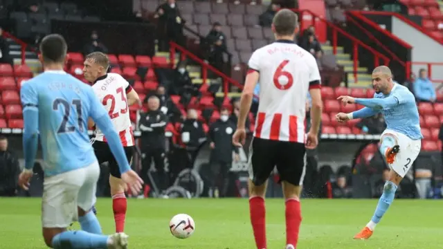 Kyle Walker fires a shot at goal against Sheffield United