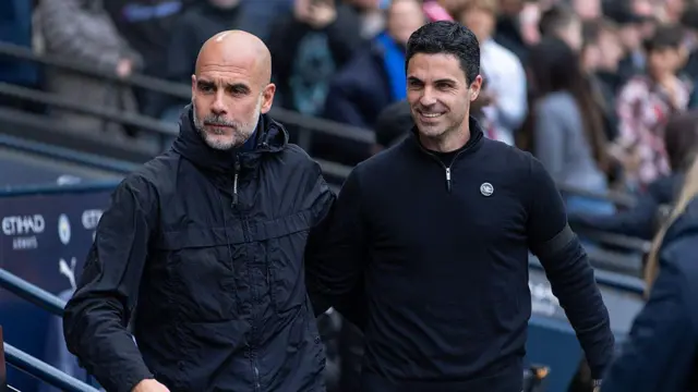 Pep Guardiola and Mikel Arteta