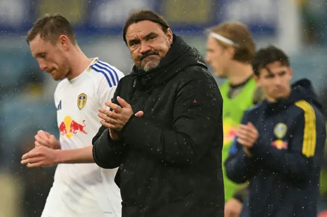 Daniel Farke applauds after defeat by Tottenham at Elland Road