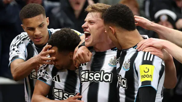 Harvey Barnes celebrates with his Newcastle teammates