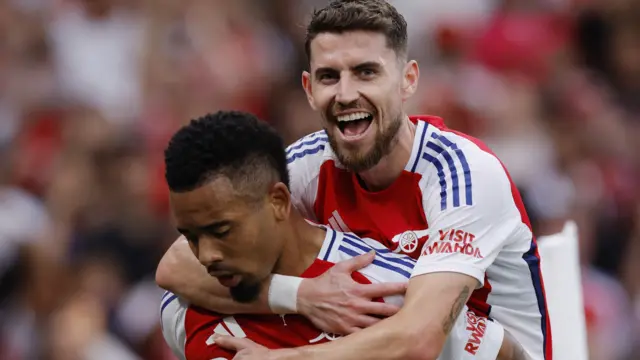 Arsenal celebrate a goal against Bayer Leverkusen