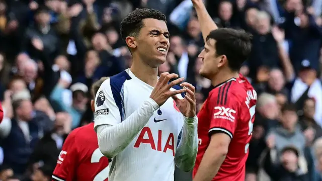 Tottenham forward Brennan Johnson reacts to being flagged offside after scoring against Manchester United