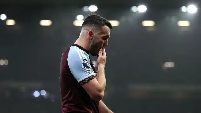 John McGinn walks off injured against Everton