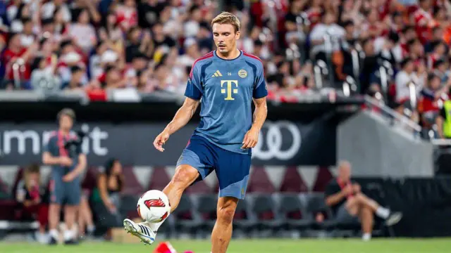 Joao Palhinha of Bayern Munich warms up