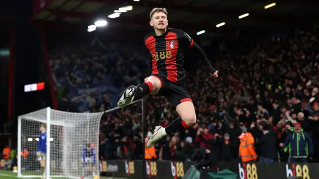 Bournemouth's David Brooks jumps in the air as he celebrates scoring 