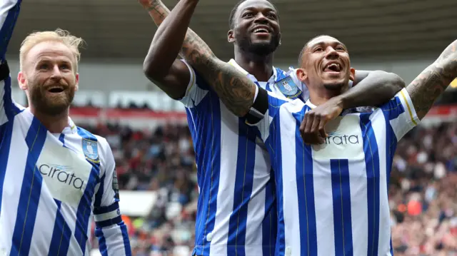 Liam Palmer celebrates a goal with his team-mates including Barry Bannan in 2024