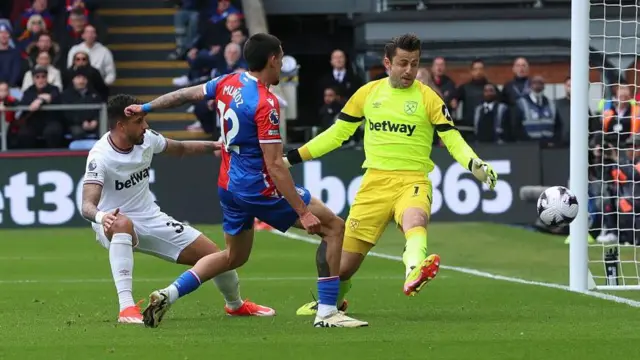 West Ham's Emerson scores an own goal in their game against Crystal Palace