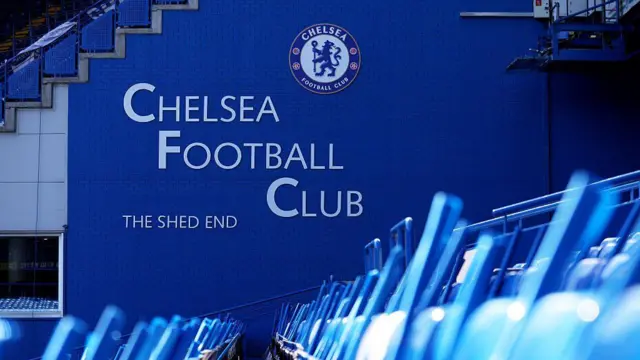 Chelsea Football Club sign and badge on the Shed End in Stamford Bridge