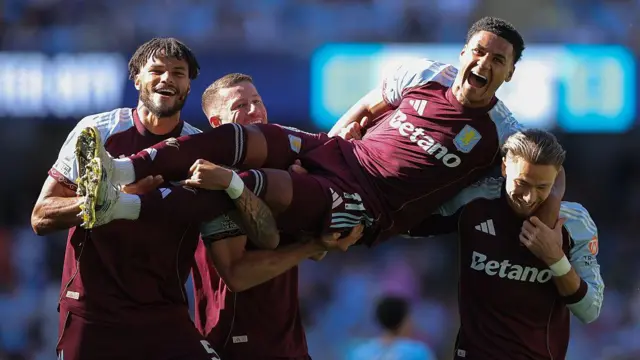 Ollie Watkins of Aston Villa celebrates with teammates