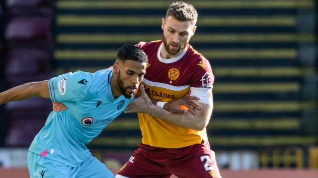 St Mirren's Jonah Ayunga and Motherwell's Stephen O'Donnell