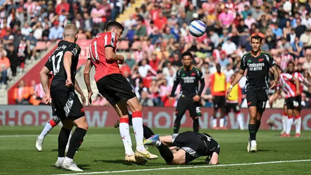 Ross Stewart heads at goal