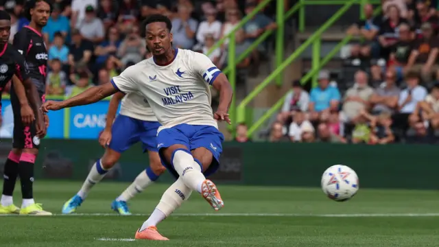 Chris Willock scores a penalty for Cardiff City at Forest Green Rovers