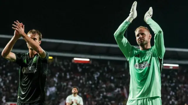 Celtic goalkeeper Kasper Schmeichel salutes fans in Belgrade last week