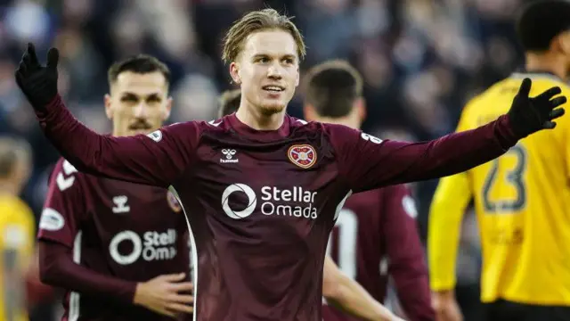 Hearts right-back Jordi Altena celebrates