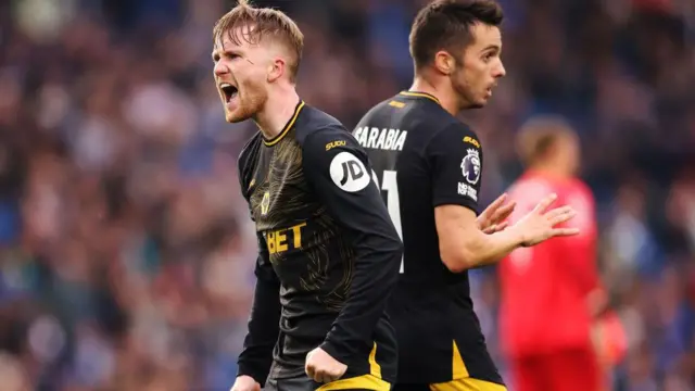Tommy Doyle celebrates against Brighton