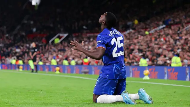 Moises Caicedo of Chelsea celebrates after scoring his side's first goal during the Premier League match between Manchester United FC and Chelsea FC at Old Trafford