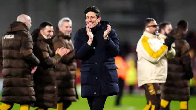 Keith Andrews applauds