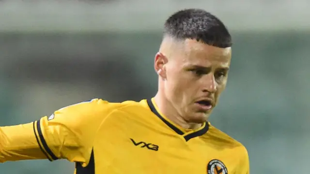 Kieron Evans playing for Newport County against Cheltenham Town