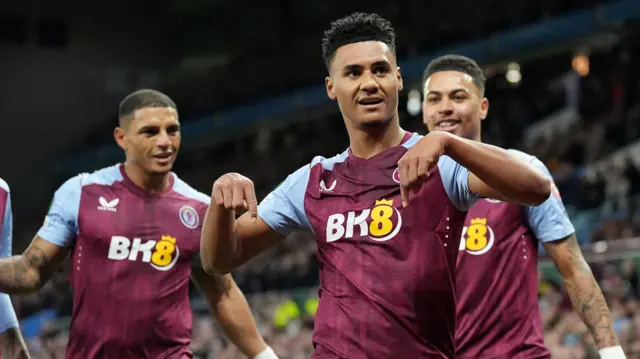 Aston Villa players celebrate