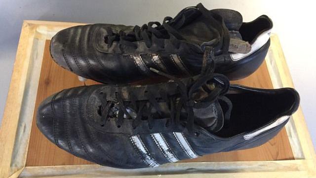 An old pair of black rugby boots