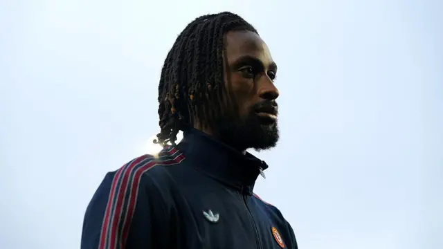 Evann Guessand looks on