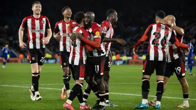 Brentford's Fabio Carvalho celebrates scoring his side's fourth goal with his teammates