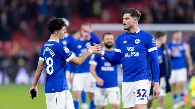 Alex Robertson and Ollie Tanner celebrate Cardiff's win at Watford