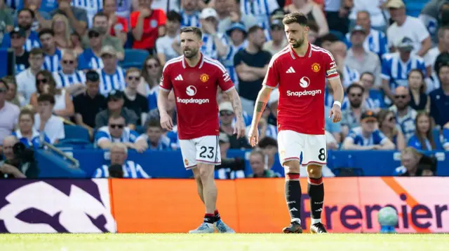 Bruno Fernandes and Luke Shaw in action for Manchester United