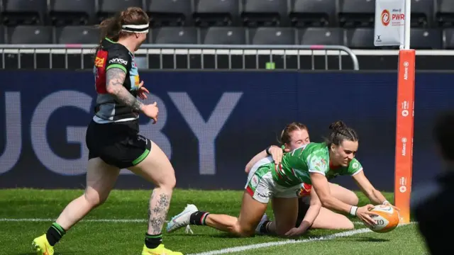 Jade Konkel watches on as Francesca McGhie scores for Leicester