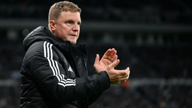 Eddie Howe applauds during match