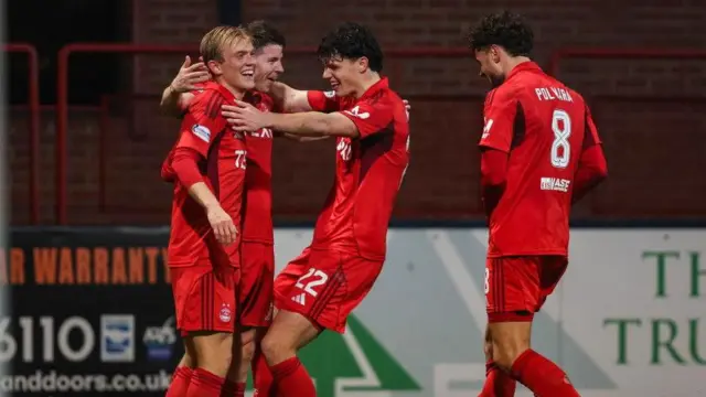 Aberdeen players celebrate