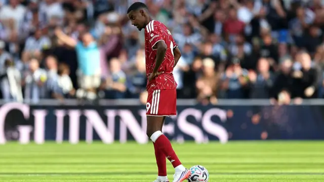 Alexander Isak looks dejected