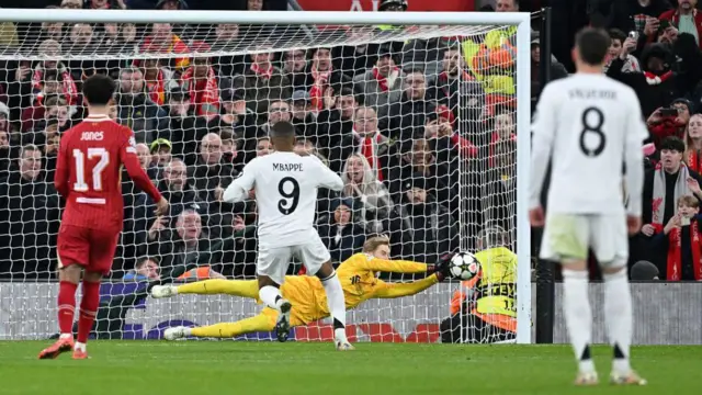 Caoimhin Kelleher saves Kylian Mbappe's penalty