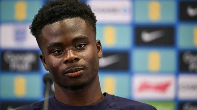 Bukayo Saka looks on during England news conference