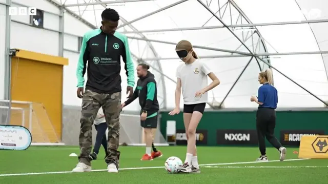 Nelson Semedo takes part in drills as part of the Super Movers day at Wolves' training ground