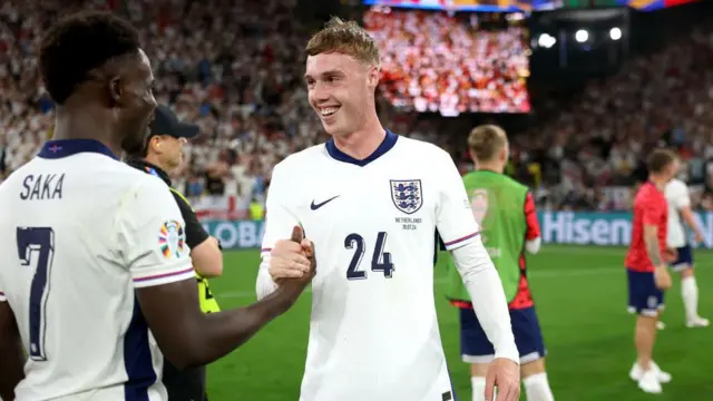 Bukayo Saka and Cole Palmer of England celebrate