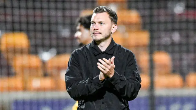 Alfred Johansson applauds Motherwell fans