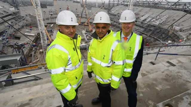 Mayor Sadiq Khan, Tottenham Chairman Daniel Levy (L), And NFL Chief Mark Waller (R) At The Construction Site For Tottenham's new stadium in 2018