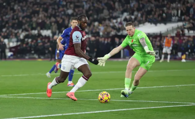 Jordan Pickford closes down Michail Antonio during West Ham's goalless draw with Everton at London Stadium