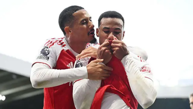 Gabriel celebrates scoring the second Arsenal goal with William Saliba
