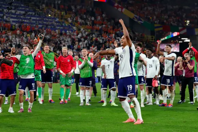 Ollie Watkins celebrates with England players